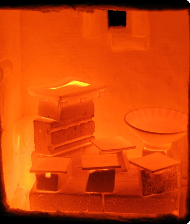 The inside of a kiln glowing orange at high temperature